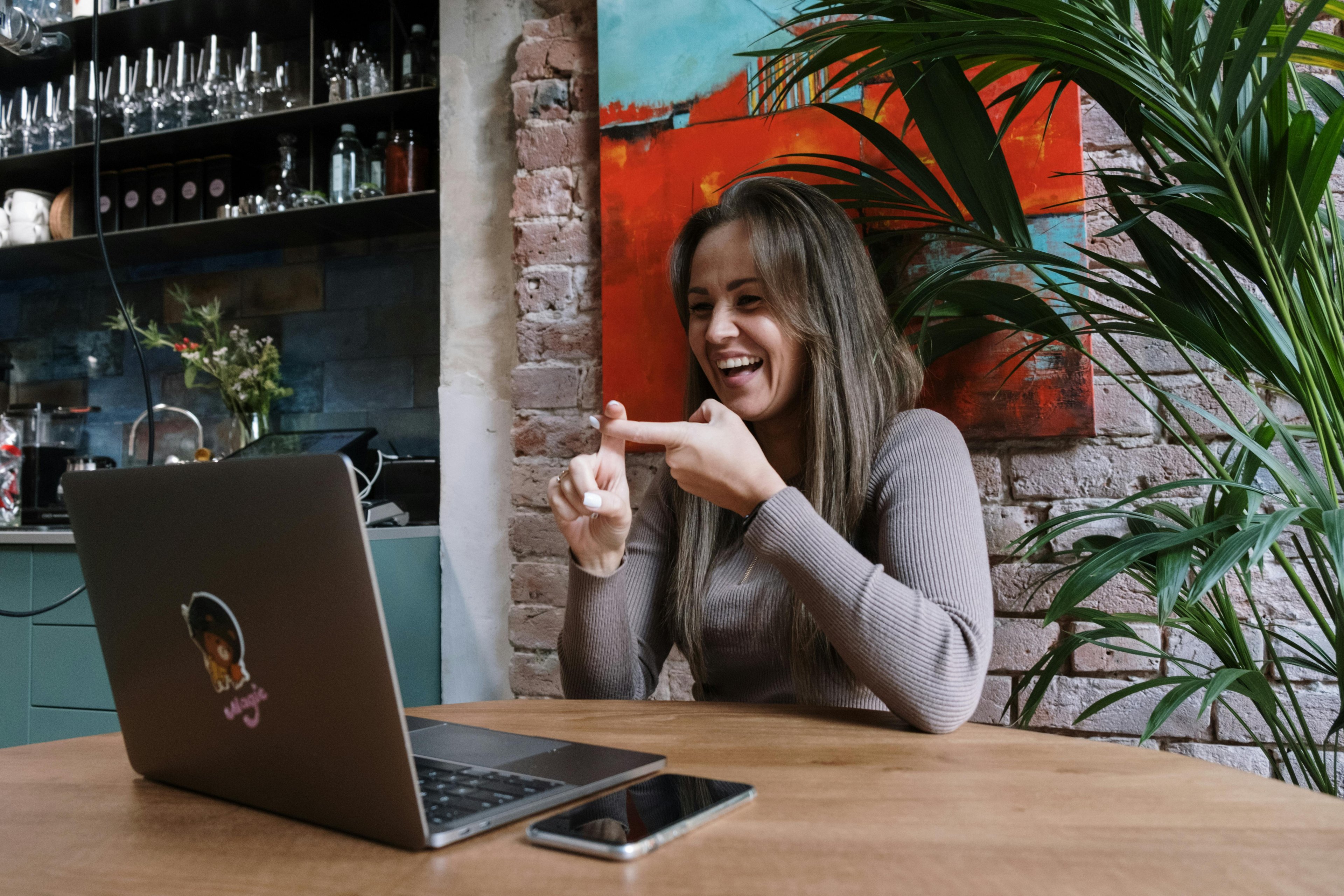 woman signing in a video call 